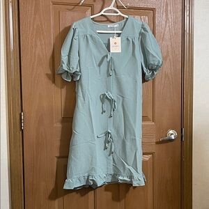 Elegant Dress in Light Blue with pockets